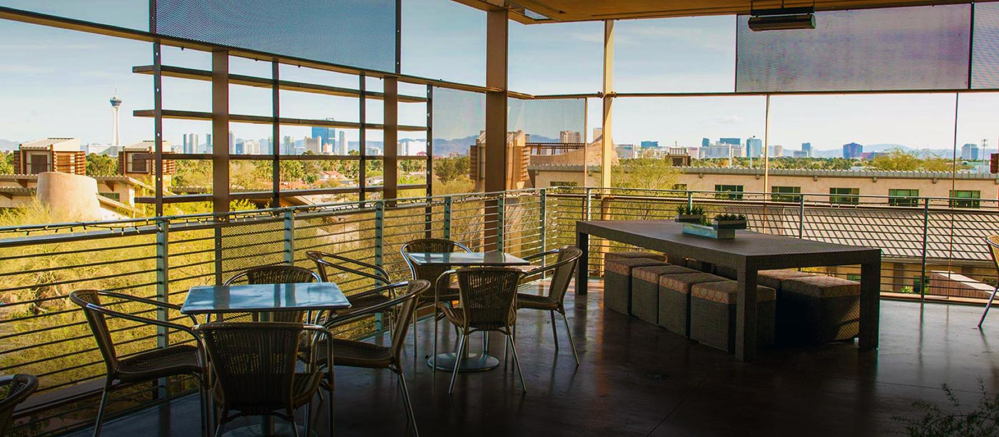 Outdoor patio at Springs Cafe overlooking Las Vegas Strip and surrounding valley