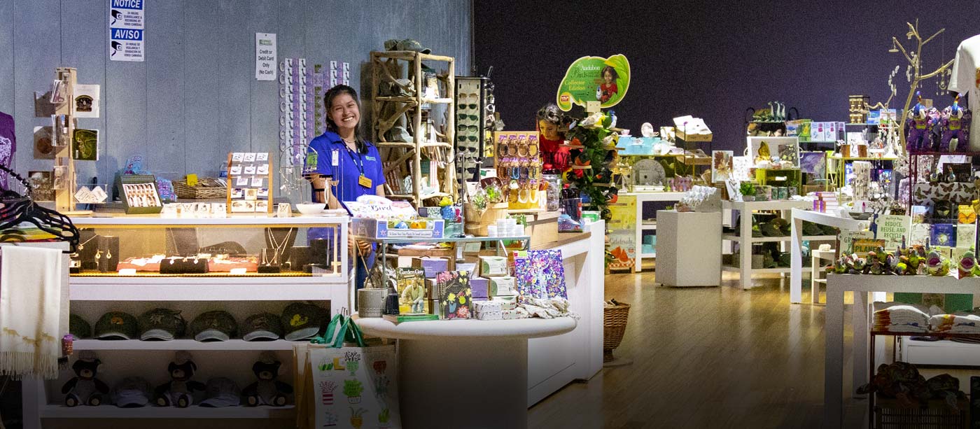 Staff smiling at entrance of the Springs Preserve Gift Shop