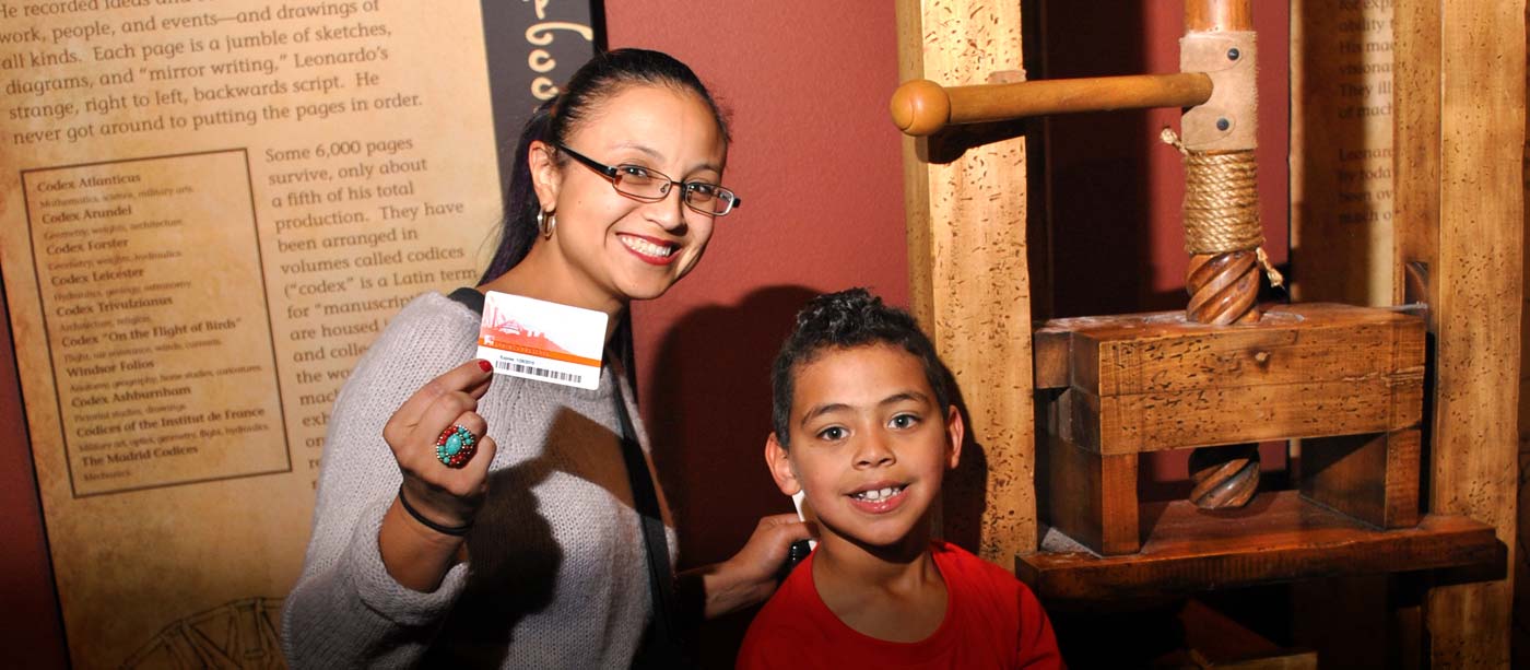 Springs Preserve members showing their membership cards