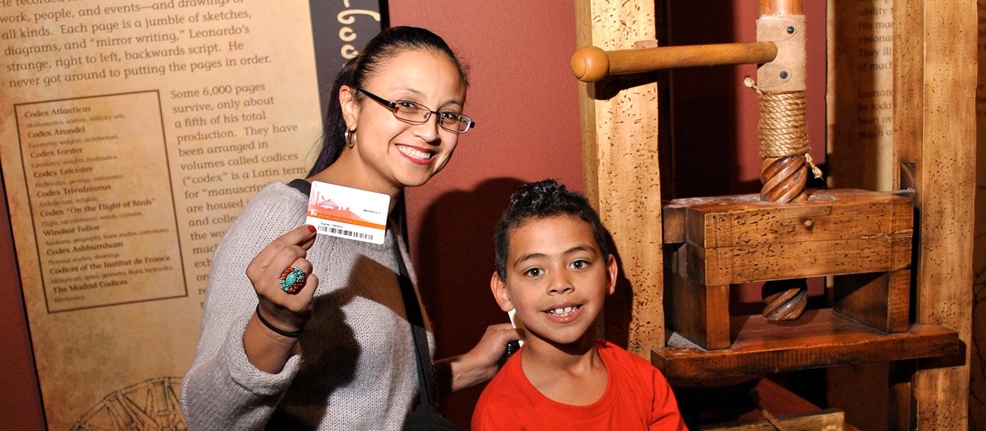 Springs Preserve members showing their membership cards