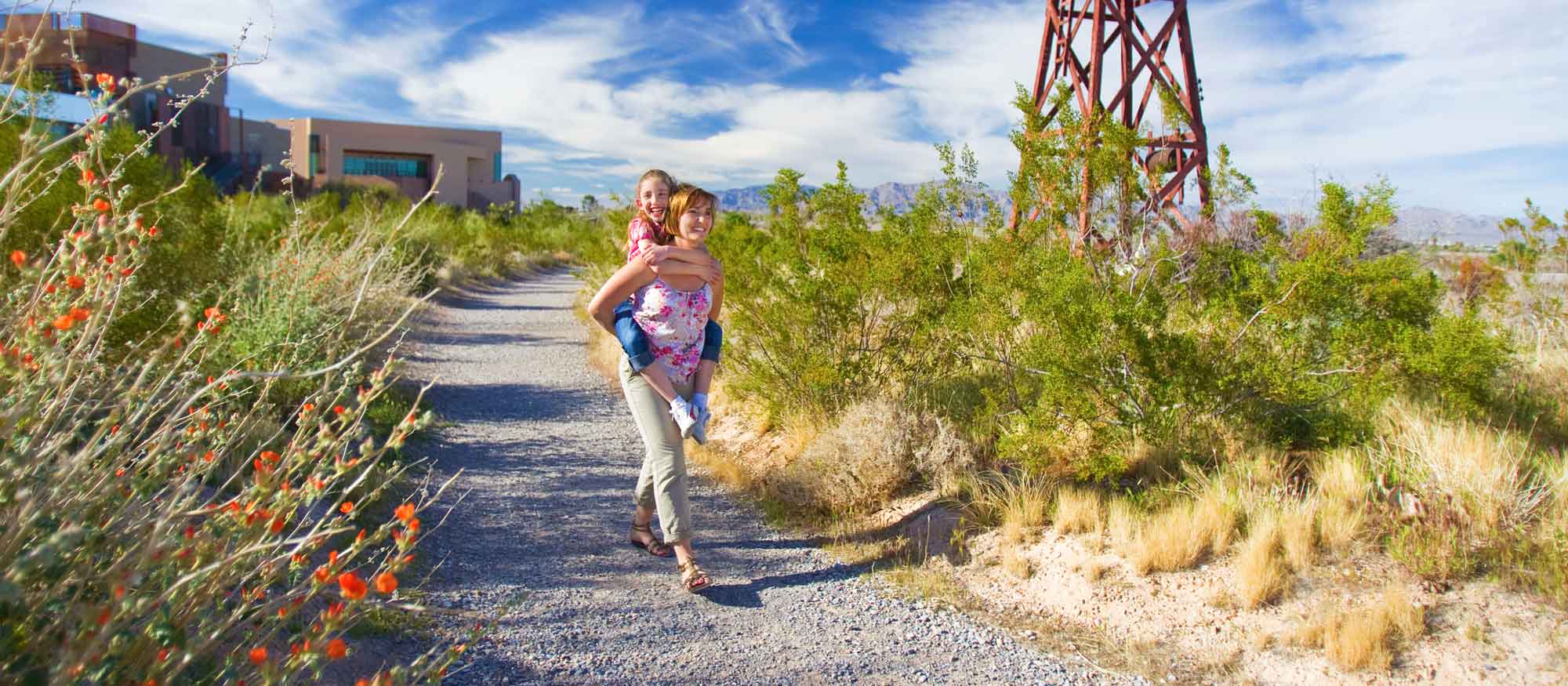 Mother and daughter walking on the Springs Preserve trails