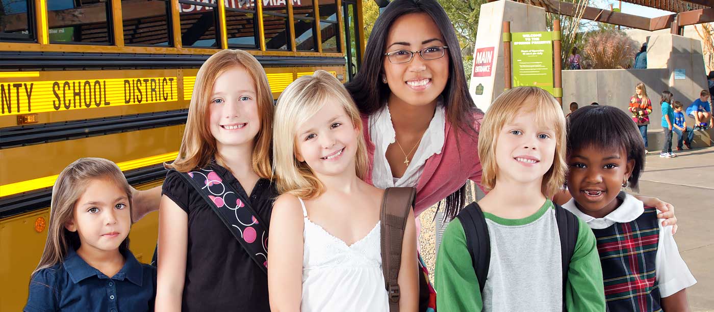School teacher with a group of students at the Springs Preserve