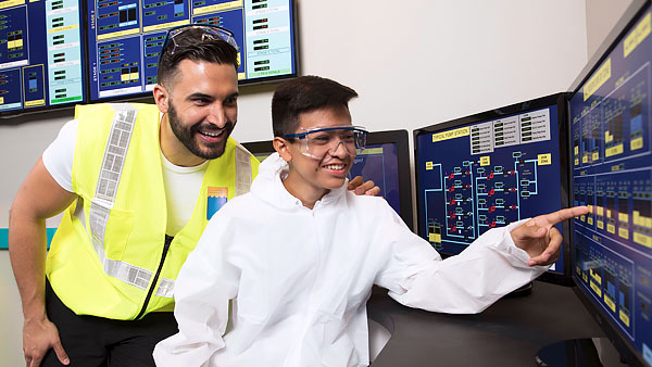 Visitors interacting at the WaterWorks computer lab